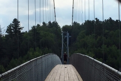 Looking across that  suspension bridge by day